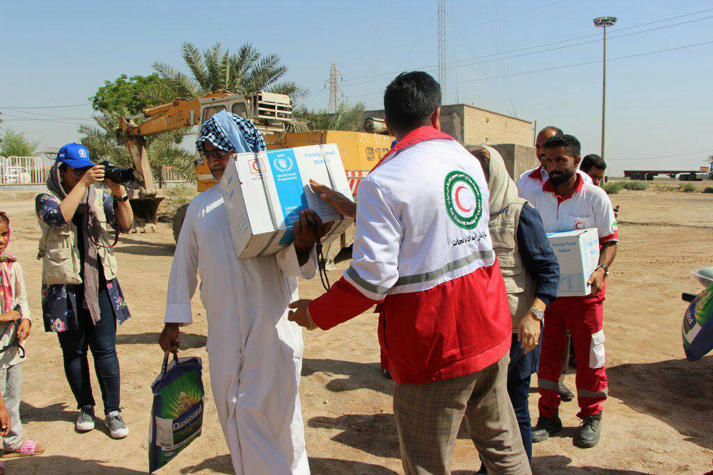 تحویل 12هزار بسته غذایی برنامه جهانی غذا(WFP) سازمان ملل به هلال احمر خوزستان