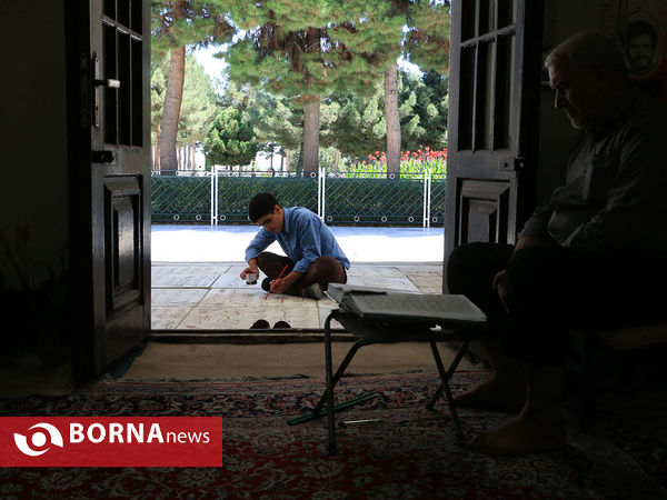 رنگ آمیزی مزار شهدا در آرامستان خواجه ربیع مشهد