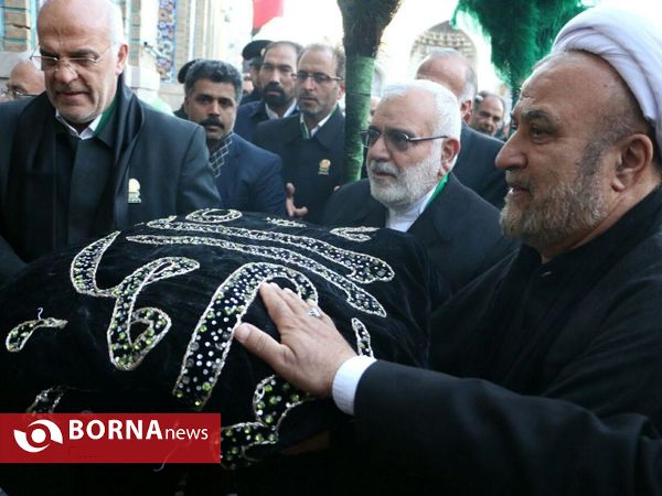 آيين تعويض پرچم گنبد منور رضوی