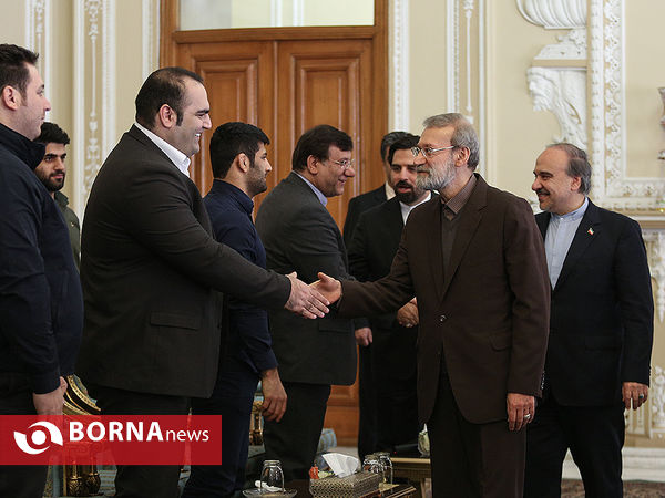 تجلیل رئیس مجلس و وزیرورزش از پهلوانان علی کریمی و تیم وزنه برداری