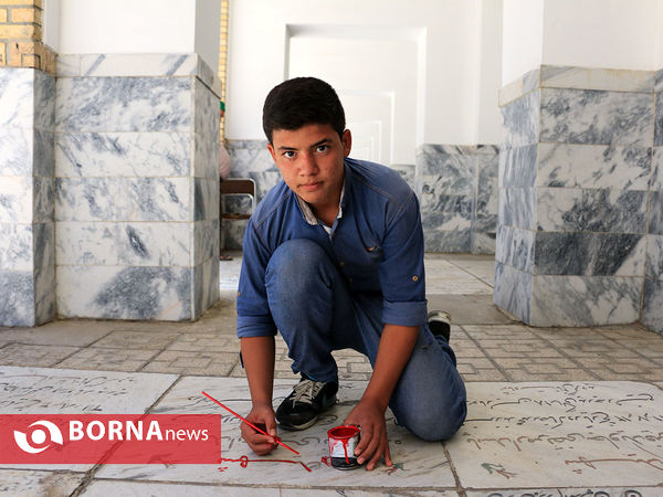 رنگ آمیزی مزار شهدا در آرامستان خواجه ربیع مشهد