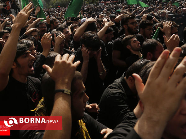 مراسم خیمه سوزان ظهر عاشورا در چهارراه گلوبندک عکاس: متین قاسمی