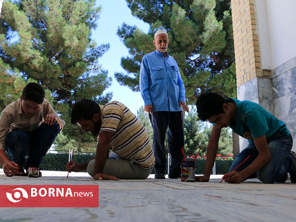 رنگ آمیزی مزار شهدا در آرامستان خواجه ربیع مشهد