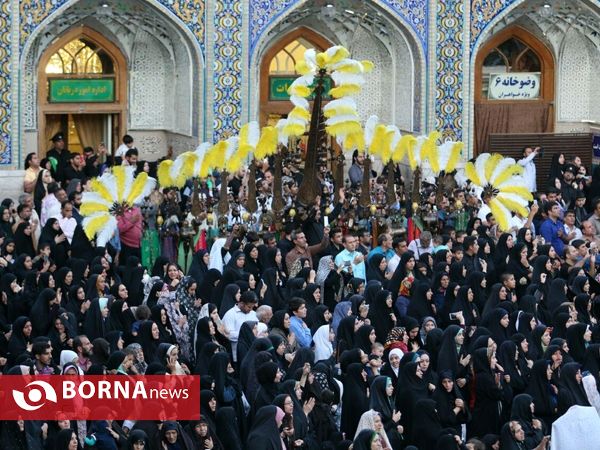 آيين تعويض پرچم گنبد منور رضوی