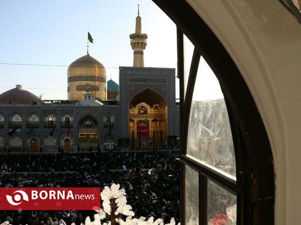 آيين تعويض پرچم گنبد منور رضوی