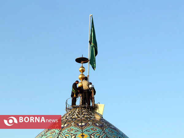 آیین تعویض پرچم گنبد حرم حضرت شاهچراغ(ع) در شیراز