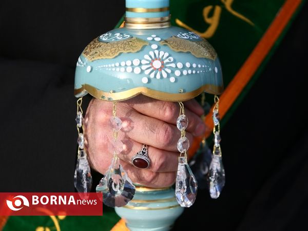 آیین تعویض پرچم گنبد مسجد مقدس جمکران