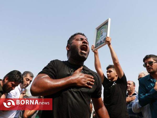 خاکسپاری جانباختگان متروپل در قطعه ورزشکاران بهشت رضای آبادان