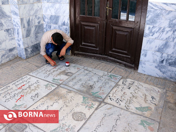 رنگ آمیزی مزار شهدا در آرامستان خواجه ربیع مشهد