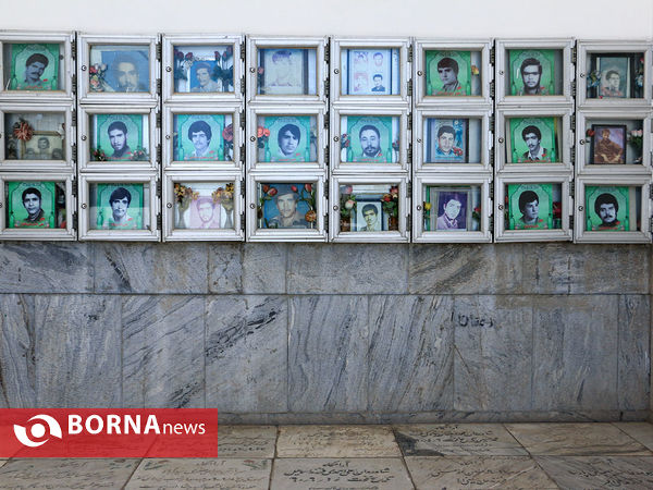 رنگ آمیزی مزار شهدا در آرامستان خواجه ربیع مشهد