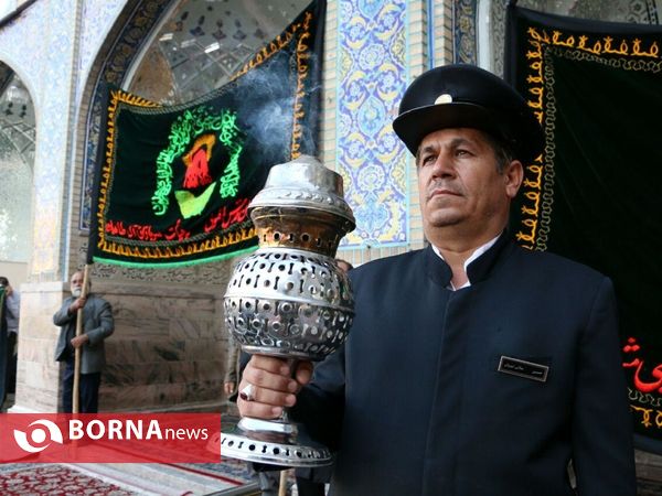 آيين تعويض پرچم گنبد منور رضوی
