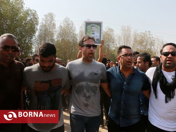 خاکسپاری جانباختگان متروپل در قطعه ورزشکاران بهشت رضای آبادان