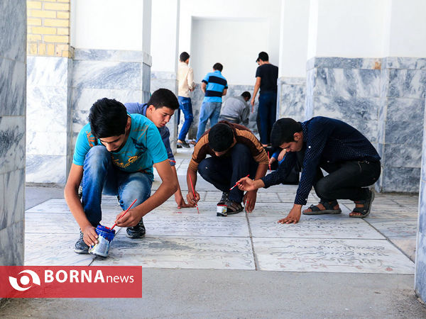 رنگ آمیزی مزار شهدا در آرامستان خواجه ربیع مشهد