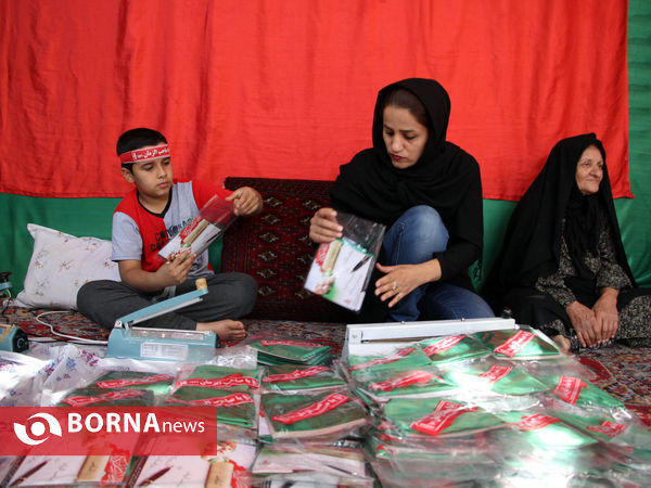 بسته بندی لباس های مراسم شیرخوارگان حسینی در شیراز