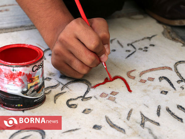 رنگ آمیزی مزار شهدا در آرامستان خواجه ربیع مشهد